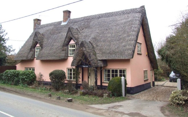 Suffolk pink thatched cottage