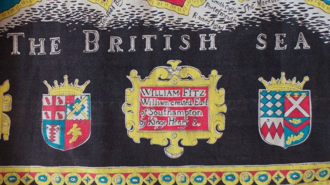 Map skirt - detail of crest